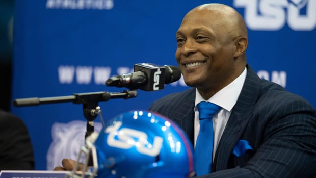 Former NFL and Tennessee Titans running back Eddie George smiles as he listens to media questions as he is announced as the new head football coach for Tennessee State University at the Gentry Center Tuesday, April 13, 2021 in Nashville, Tenn.